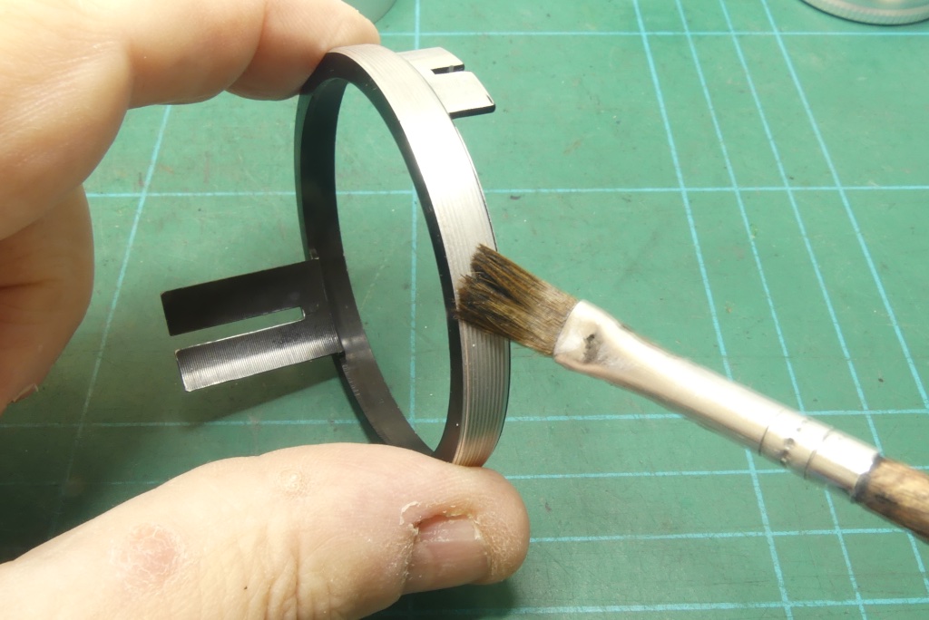 Nikkor-Q lubricating the aperture control ring